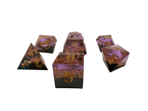 Pixies Pride - Pink Translucent with Gold Color Inclusions and Black Translucent Layer with Gold Numbering 7pc Sharp-Edge Dice Set