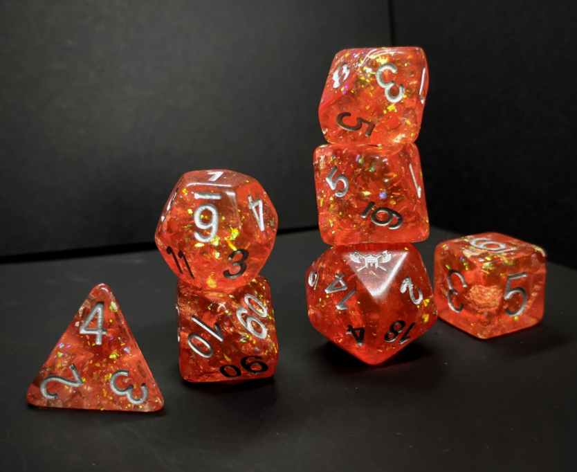 Andrar's Fury™️ - Orange with Foil Inclusions and Silver Numbers Dice Set